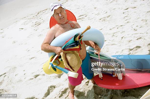 prepared for the beach - fat man on beach stock pictures, royalty-free photos & images