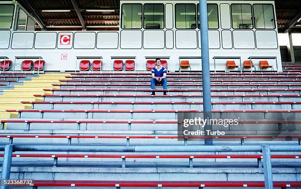 spectator in stadium - stadium seating stock pictures, royalty-free photos & images