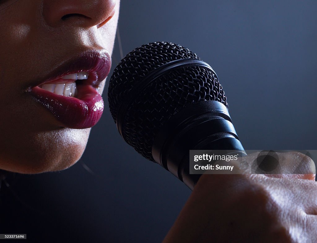 Singer with Microphone