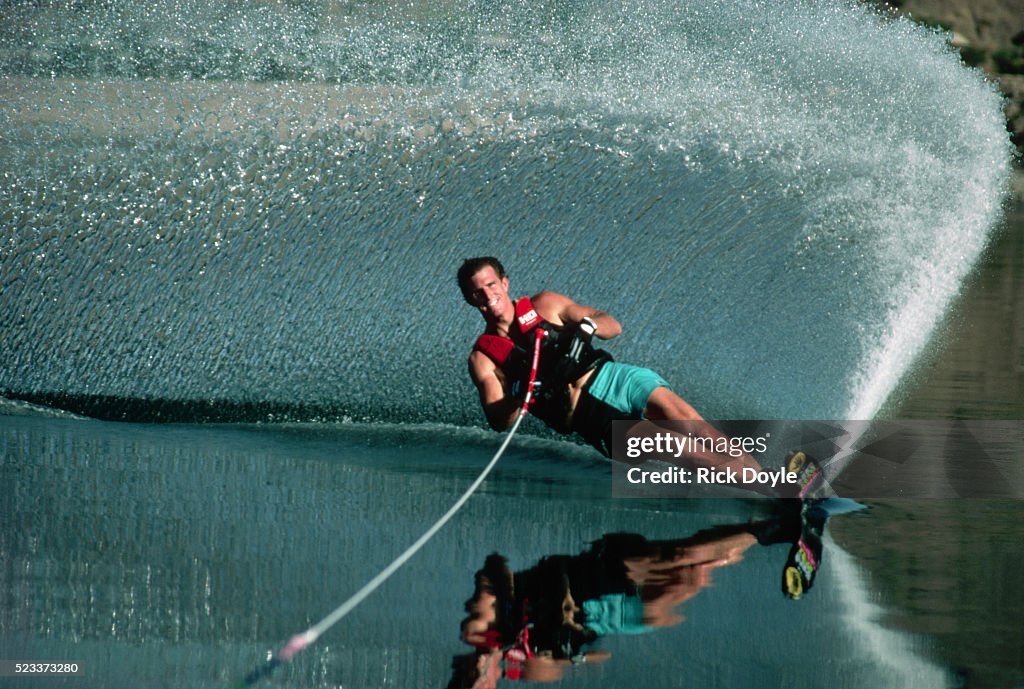Water Skier Splashing on a Slalom Turn