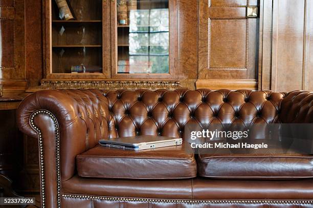 leather sofa in study - leather couch stock pictures, royalty-free photos & images