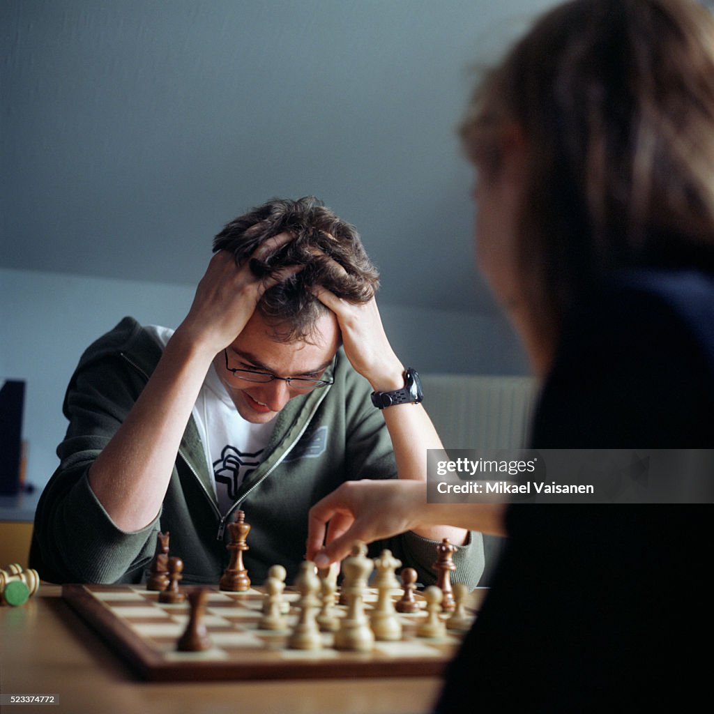 Friends Playing Chess