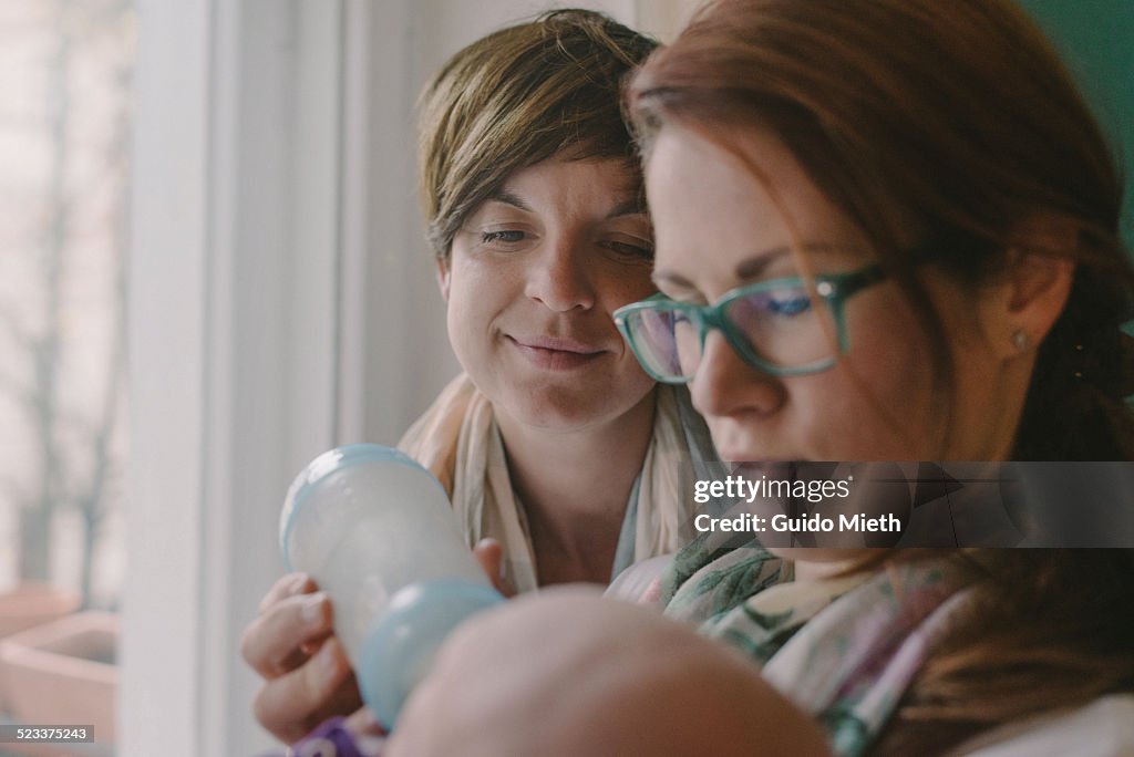 Lesbian couple with baby.