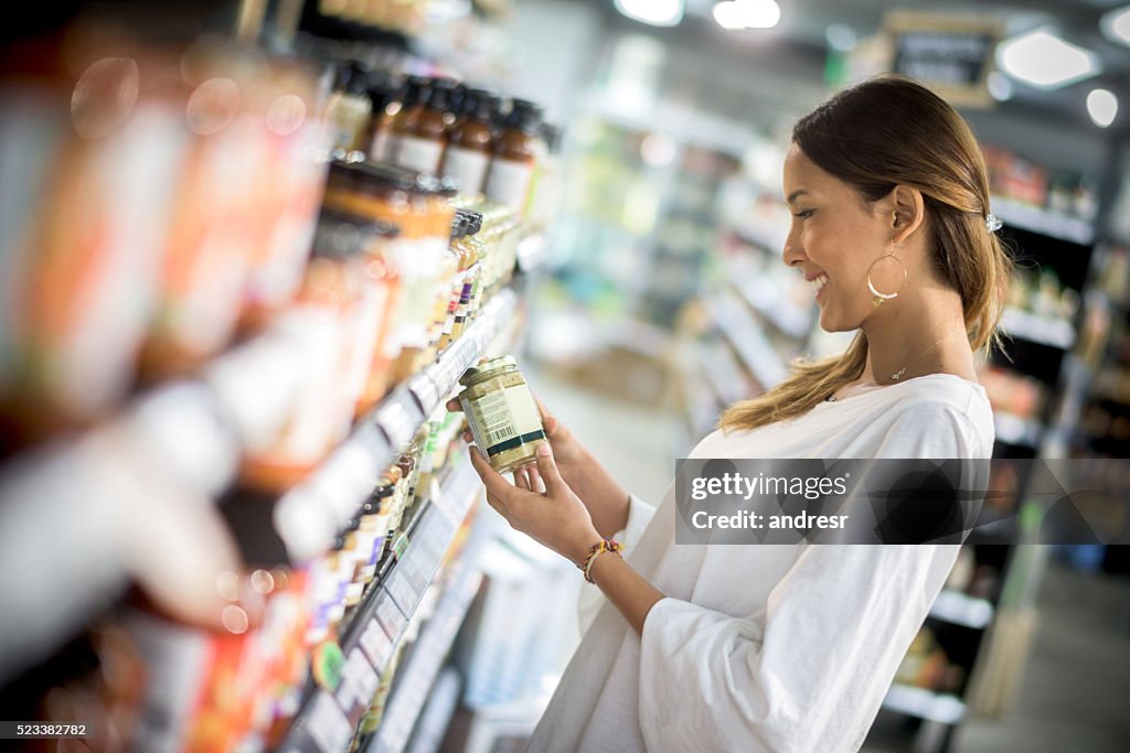 Asian woman grocery shopping