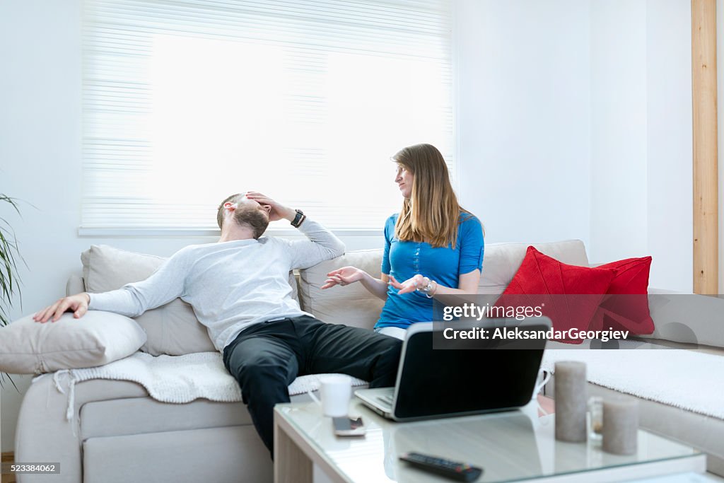 Man Suffering from Headache while Woman Quarreling