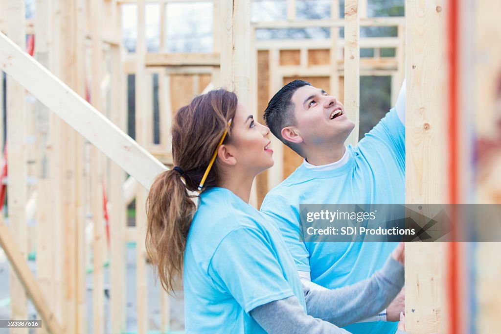 Couple working together to build home for charity