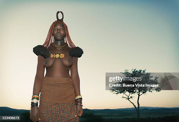 himba woman at sunrise - opuwo tribe stock-fotos und bilder