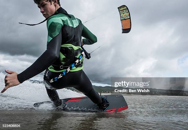 kitesurfer having fun. - kite surfing stock pictures, royalty-free photos & images