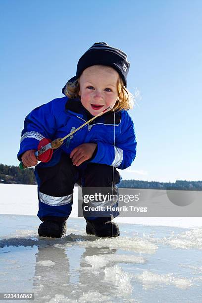 boy ice-fishing - sverige vinter bildbanksfoton och bilder