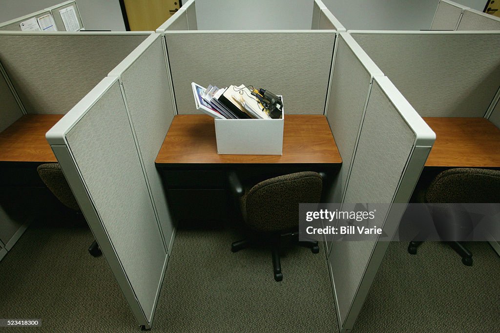 Cubicle with Box of Personal Belongings