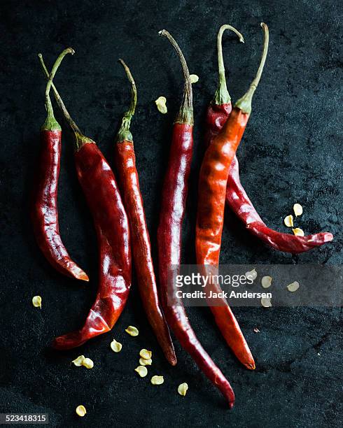 dried chilli peppers - chili stock pictures, royalty-free photos & images