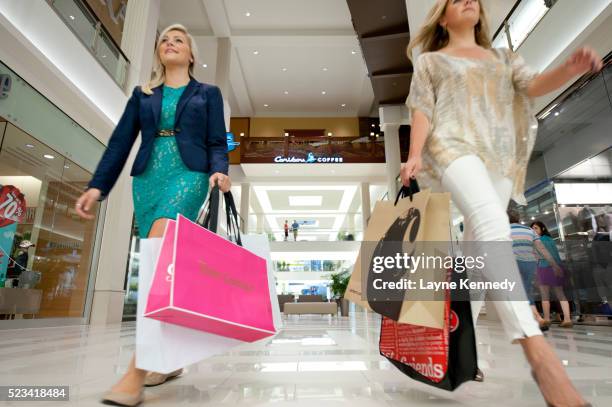 ladies shopping at macy's-mall of america, bloomington, minnesota - mall of america stock pictures, royalty-free photos & images
