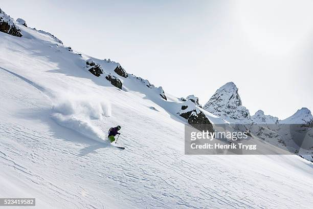 powder skiing - skiing mountain stock pictures, royalty-free photos & images