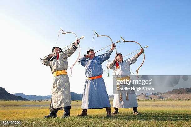 mongolian archers - mongolian archery stock pictures, royalty-free photos & images