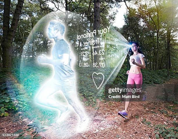 woman running with virtual personal trainer - human hologram stock pictures, royalty-free photos & images