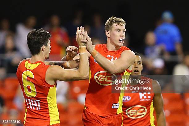 Tom Lynch of the Suns celebrates a goal during the round five AFL match between the Gold Coast Suns and the North Melbourne Kangaroos at Metricon...