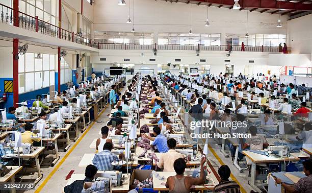 busy textile factory - hugh sitton india fotografías e imágenes de stock