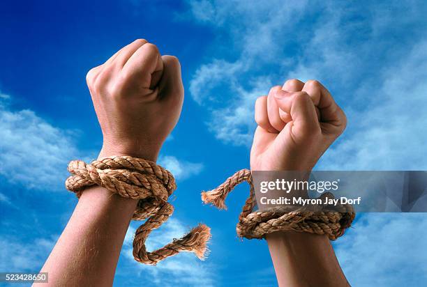 freedom - hands breaking free stock pictures, royalty-free photos & images