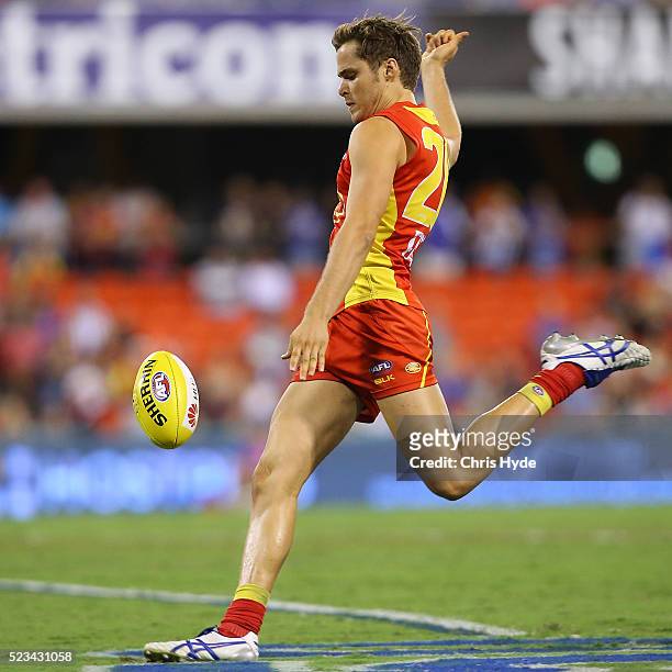 Kade Kolodjashnij of the Suns kicks during the round five AFL match between the Gold Coast Suns and the North Melbourne Kangaroos at Metricon Stadium...