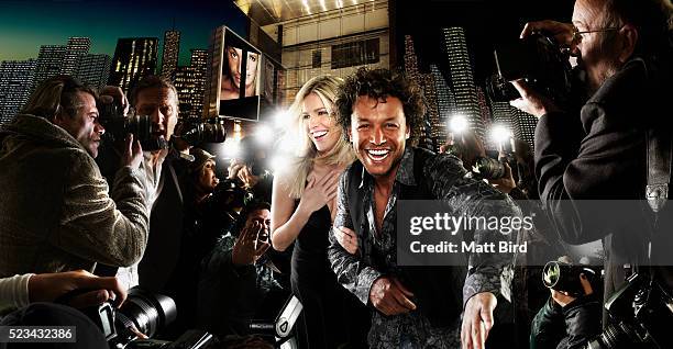 celebrities walking through paparazzi - paparazzi red carpet stock pictures, royalty-free photos & images