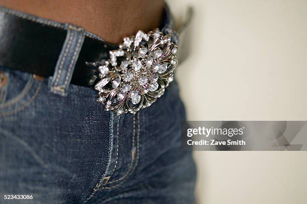 woman wearing diamond studded belt - schnalle stock-fotos und bilder
