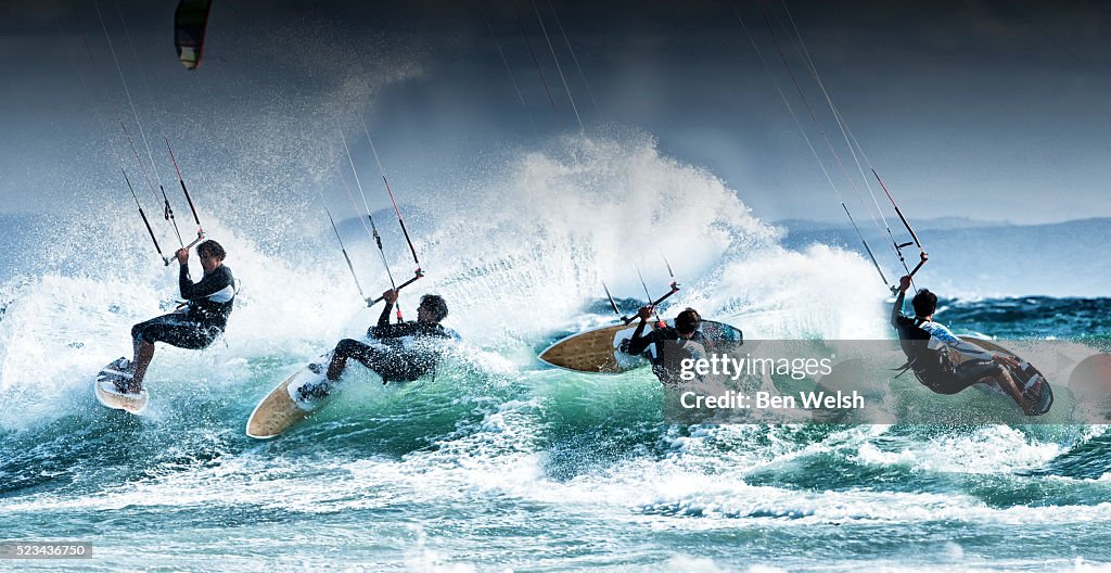 Kitesurfer surfing a wave