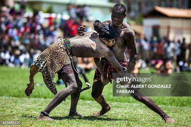 Two wrestlers from Terekeka and Jonglei compete at the final match of the South Sudan National Wrestling Competition at Juba Stadium, on April 23,...