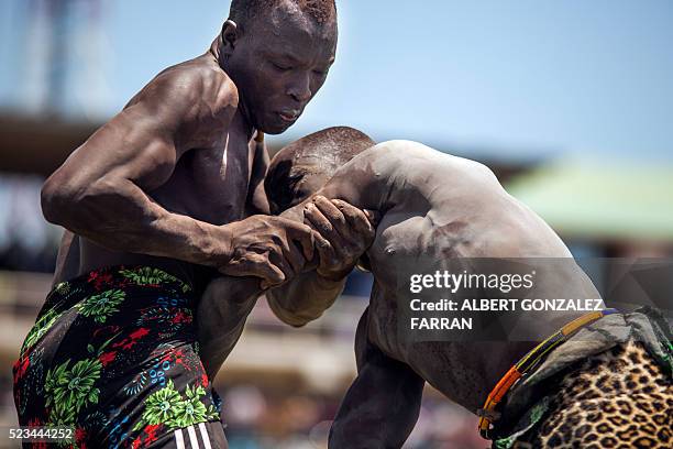 Two wrestlers from Terekeka and Jonglei compete at the final match of the South Sudan National Wrestling Competition at Juba Stadium, on April 23,...