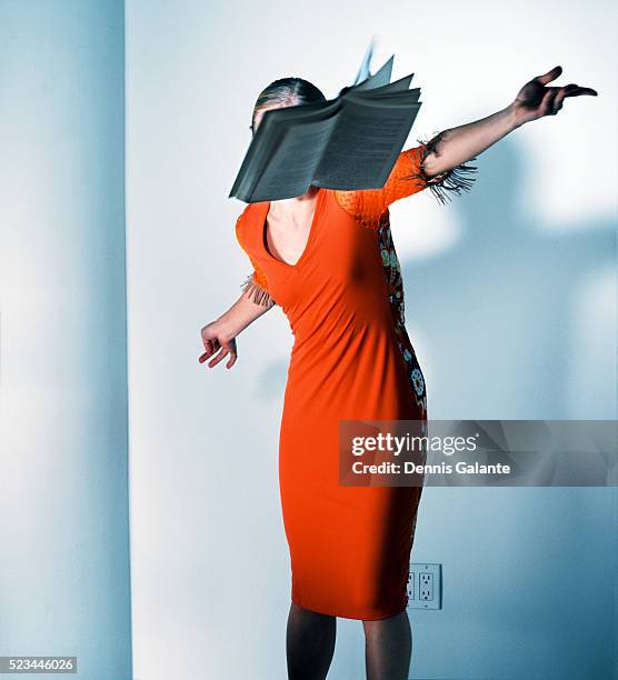 woman throwing book - angry woman vintage stock pictures, royalty-free photos & images