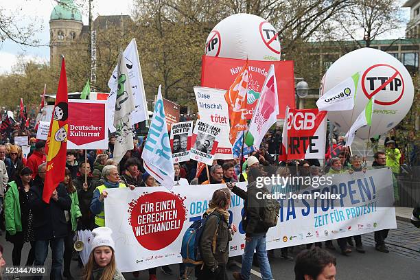 SumOfUs Activists protest during an Anti-TTIP Demonstration on April 23, 2016 in Hanover, Germany. People protest against the reducing of the...