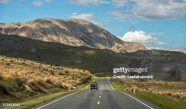 road near castle hills in new zealand, south island - new zealand ski stock pictures, royalty-free photos & images