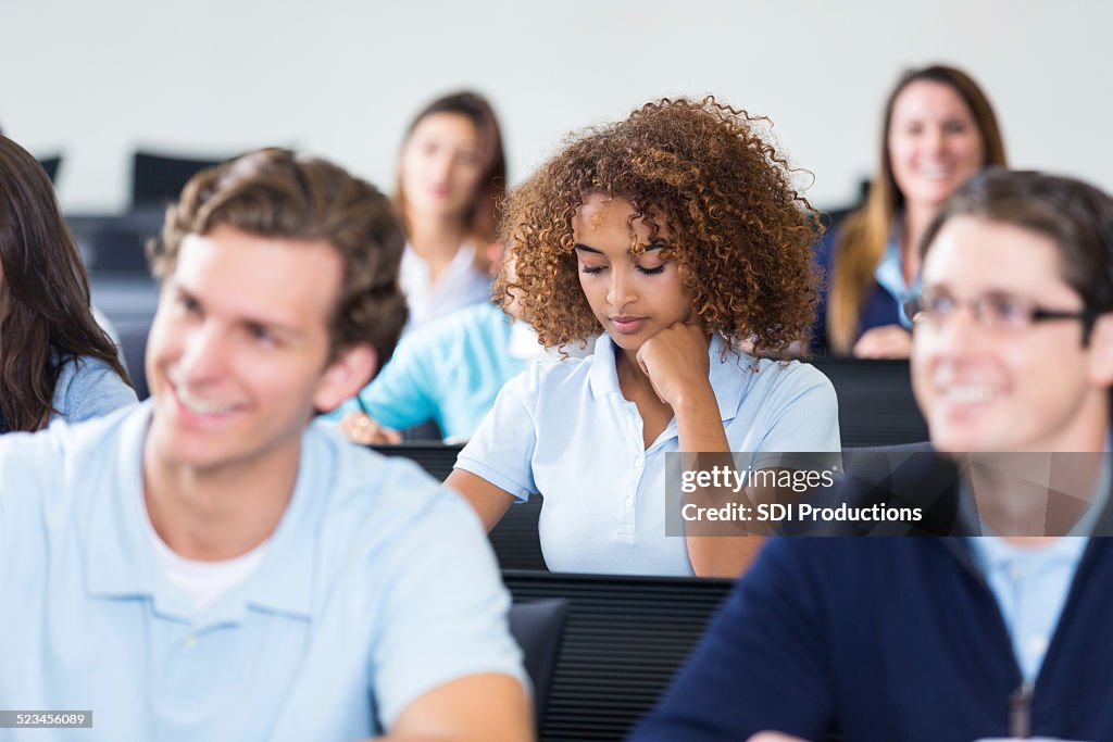 Taking Notes In Lecture Classroom Lecture Depicting Students Taking Notes High-Res Stock Photo ...