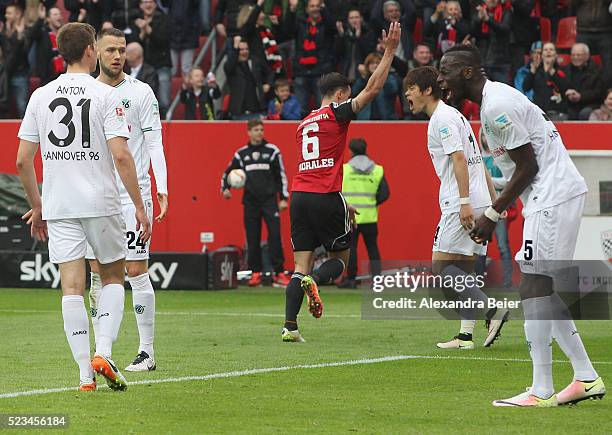 Waldemar Anton, Milosevic Sjoestroem, Hiroshi Kiyotake and Salif Sane of Hannover 96 react after Ingolstadt's Alfredo Morales celebrates his team's...