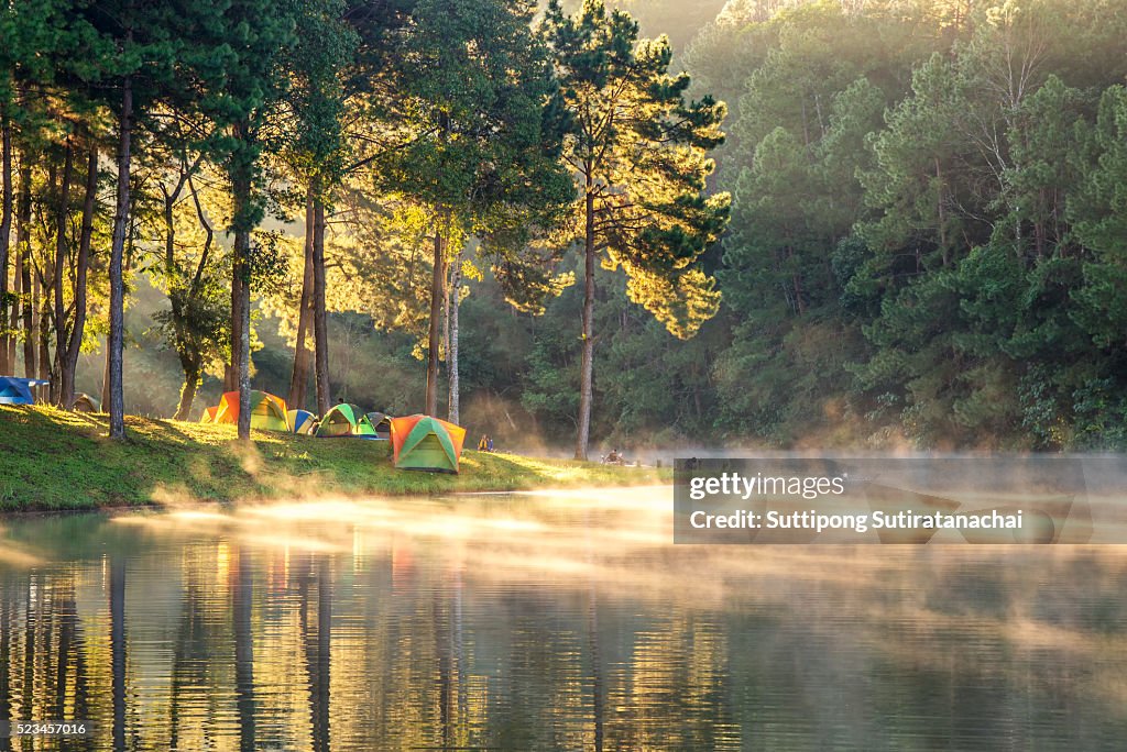 Morning in pang oung with the light and shadow and steam over the lake in meahongson,Thailand