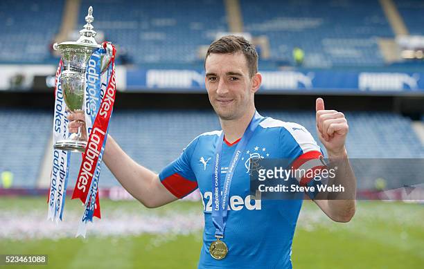 Lee Wallace the Rangers Captain lifts the Scottish Championship Trophy at Ibrox Stadium April 23, 2016 in Glasgow, United Kingdom.