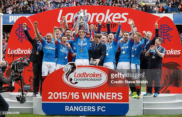 Rangers captain Lee Wallace lifts the Scottish Championship Trophy at Ibrox Stadium on April 23, 2016 in Glasgow, United Kingdom.