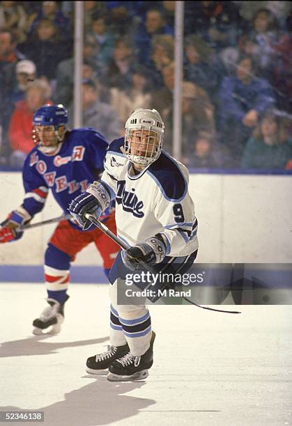 Canadian hockey player Paul Kariya of the University of Maine Black Bears skates on the ice, 1993.