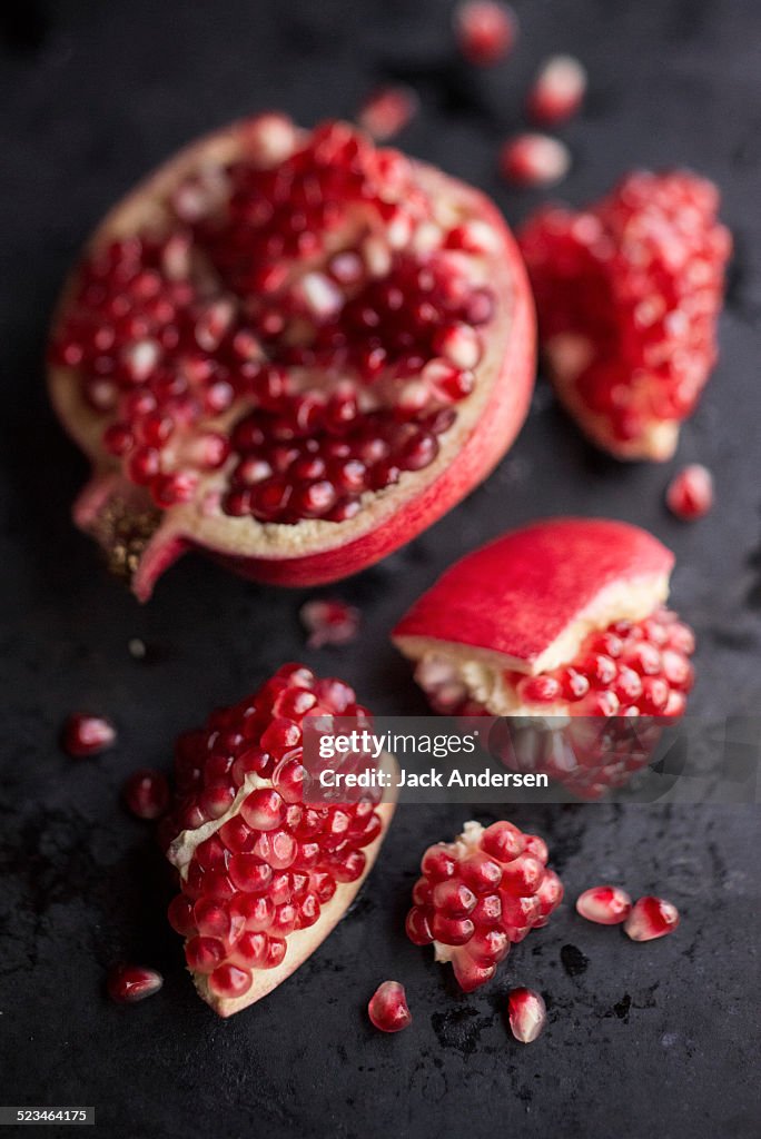 Opened pomegranate and arils