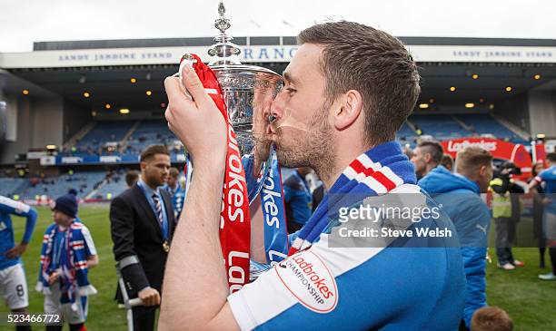 Nicky Clark of Rangers lifts the Scottish Championship Trophy after the Scottish Championship match between Rangers and Alloa Athletic Scottish at...
