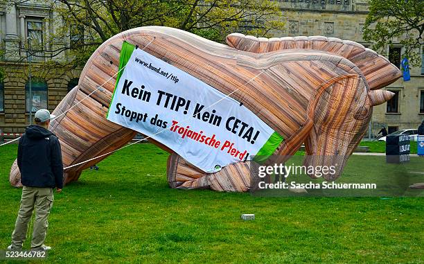 Protesters rallying against the TTIP and CETA free trade agreements march on the eve of a visit by U.S. President Barack Obama on April 23, 2016 in...