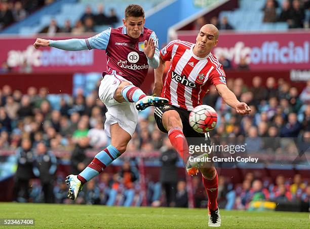 Oriol Romeu of Southampton cannot stop Ashley Westwood of Aston Villa scoring his sides first goal during the Barclays Premier League match between...