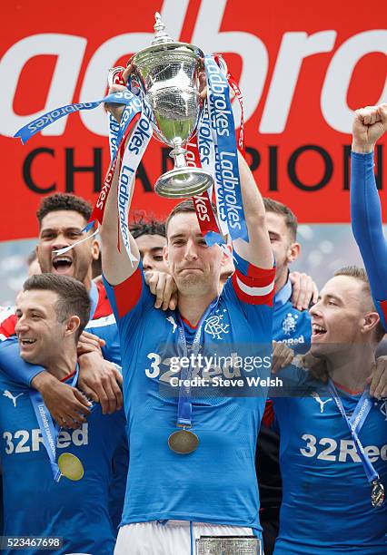 Lee Wallace the Captain of Rangers lifts the Scottish Championship Trophy after their match against Alloa Athletic at Ibrox Stadium on April 23, 2016...