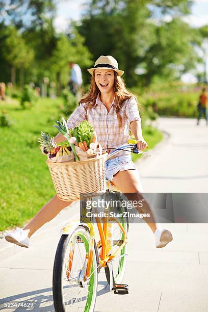 full of life - living healthily - woman on bicycle stock pictures, royalty-free photos & images