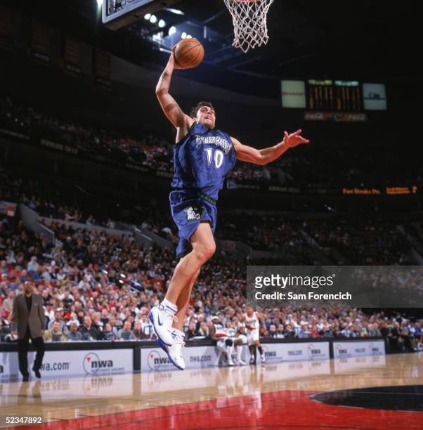 Wally Szczerbiak of the Minnesota Timberwolves drives to the basket during the game against the Portland Trail Blazers at The Rose Garden on February...