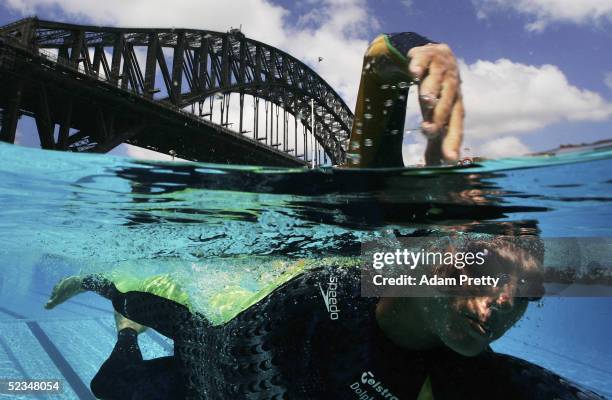 Grant Hackett of Australia Swims in North Sydney Pool under the Sydney Harbour Bridge during the Swimming Australia Speedo Sponsorship Launch on...