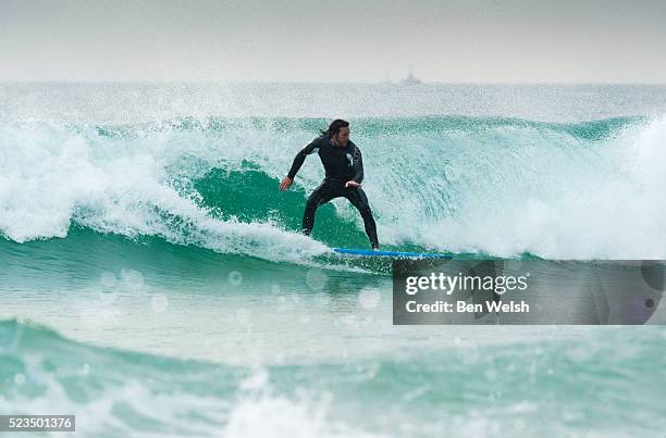 man surfing, tarifa, costa de la luz, cadiz, andalusia, spain - tariffa stock pictures, royalty-free photos & images