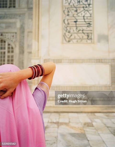 young woman in sari at taj mahal - hugh sitton india stock pictures, royalty-free photos & images