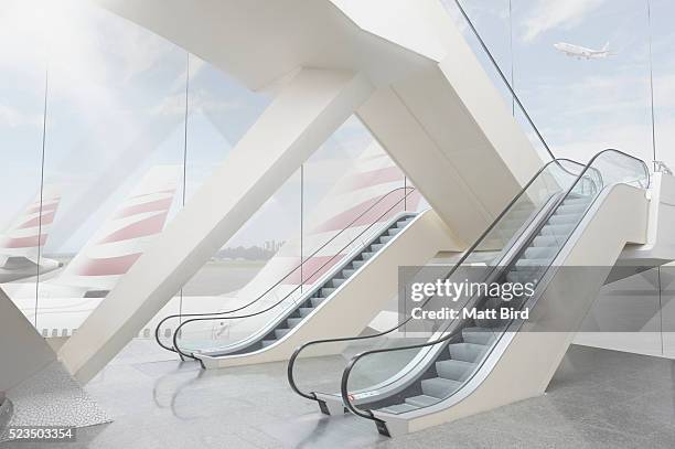 empty modern airport building - escalators stockfoto's en -beelden