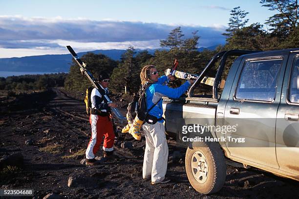 skiers loading gear into pickup truck - pucon stock pictures, royalty-free photos & images