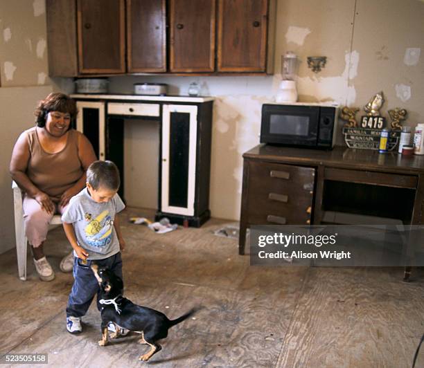 rio grande valley; colonia mt. davis estates, mexican immigrants. paulina rodriguez and son vidal at home - single mother poor stock pictures, royalty-free photos & images